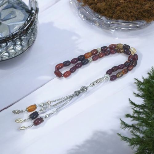 سبحه عقيق برازيلي اسطواني بني مموج