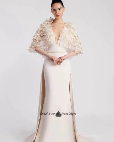 Simple evening dress with mermaid style from crepe from Vindal with a V-shaped neckline