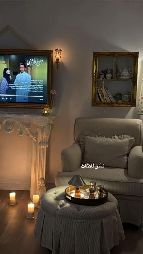 كرسي مع بوف دائري قماش مقلم