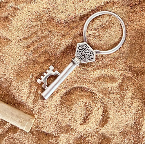 Silver medal key – "If God closes a door, He opens a thousand"