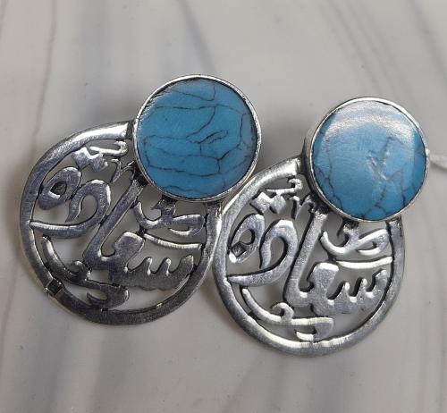 Silver hoop with precious turquoise stone