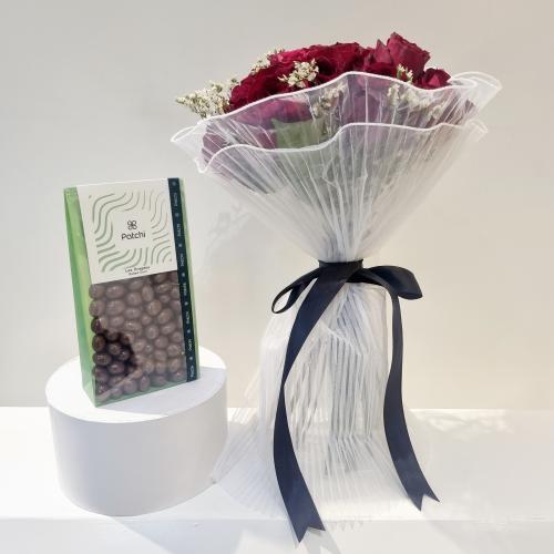 باقة جوري احمر مع شوكولاته بالحليب من باتشي