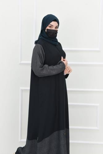 عباية بلون اخضر داكن بتفاصيل مقلمة
