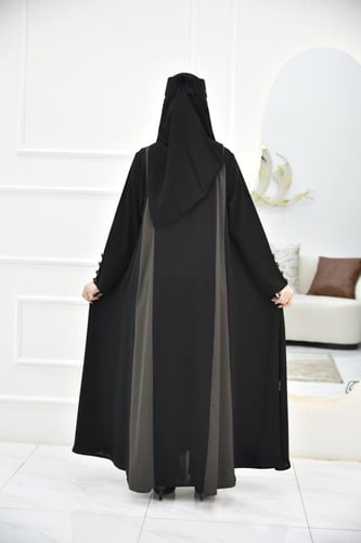 عباية كلوش حريرية بتفاصيل زيتيه ساحرة