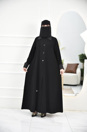 عباية عملية بأكمام مقلوبة وأزرار مميزة