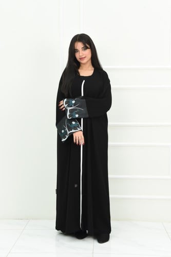 عباية ليوم التأسيس: بتطريز تراثي وخط سكري مميز من...