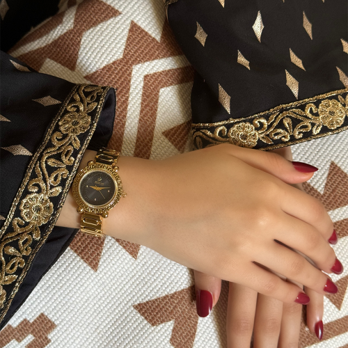 ساعة نسائية استيل باللون الذهبي ميناء اسود
