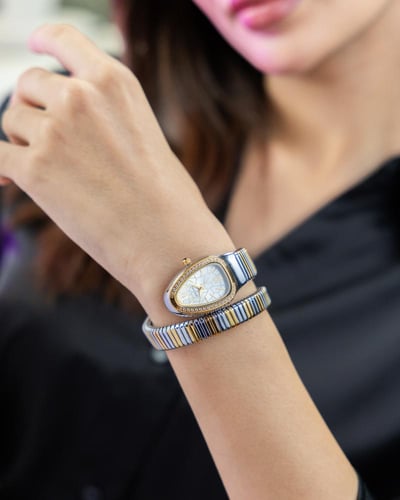 ساعة فاخرة بتصميم أنثوي راقٍ باللون المكس