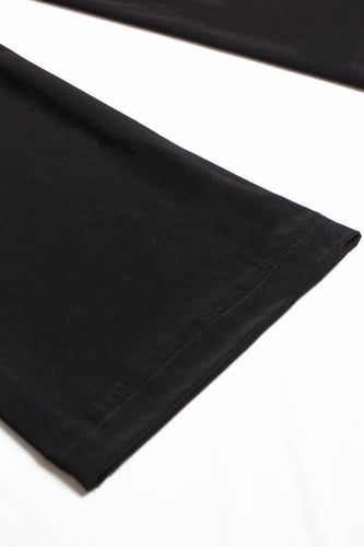 بنطلون نسائي أسود بتصميم كلاسيكي مع ربطة أمامية