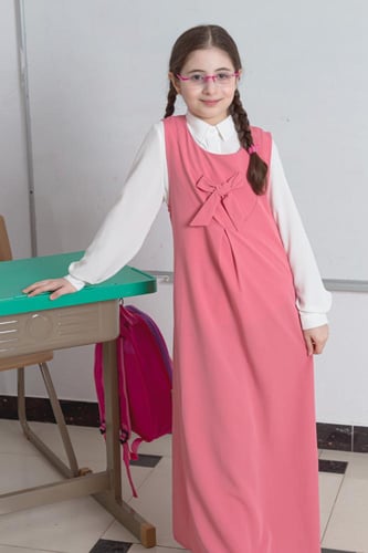 مريول مدرسي زهري بسيط وأنيق مع فيونكة أمامية