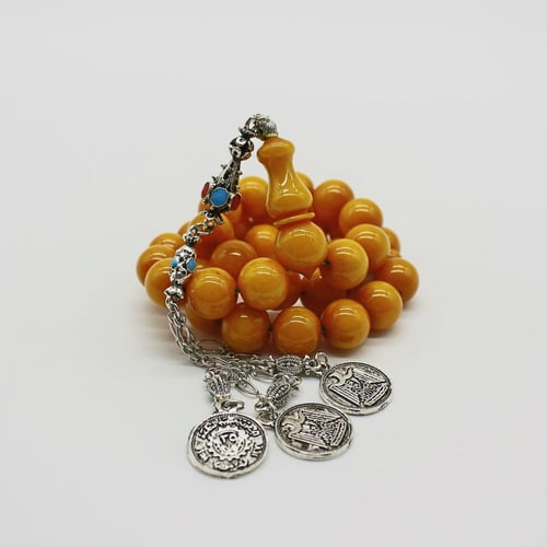 سبحة مسكي عسلي معتق بحبات دائرية وشرابة أثرية