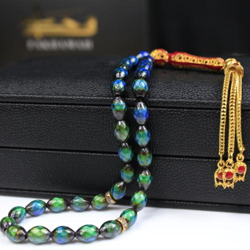 سبحة احساس خرز بيضوي شرابة ذهبي و احمر