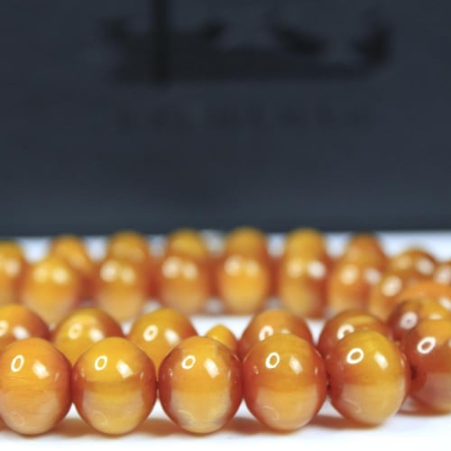 مسباح مسكي عسلي بلمسة أثرية و خرز دائري كبير