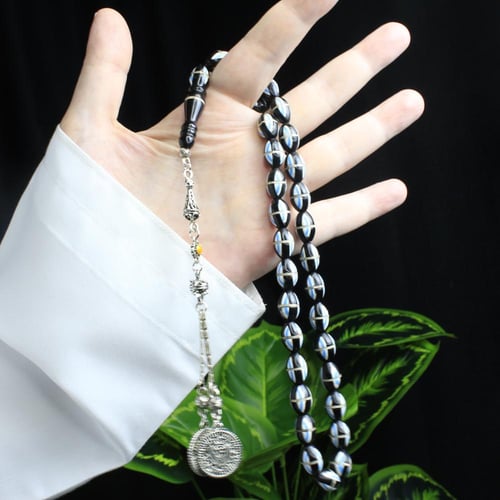 سبحة كوك طبيعي 33 خرزة بيضوية مرصعة بالالمنيوم