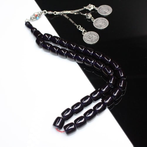 سبحة مسكي باللون الاسود البراق مع شرابة مزيج من ال...