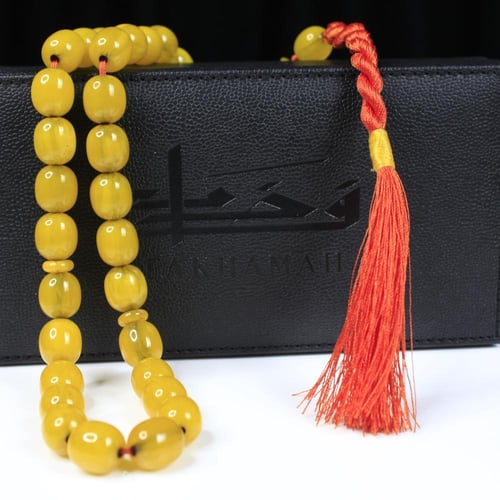 مسباح مسكي أصفر بخرز بيضوي متوسط الحجم