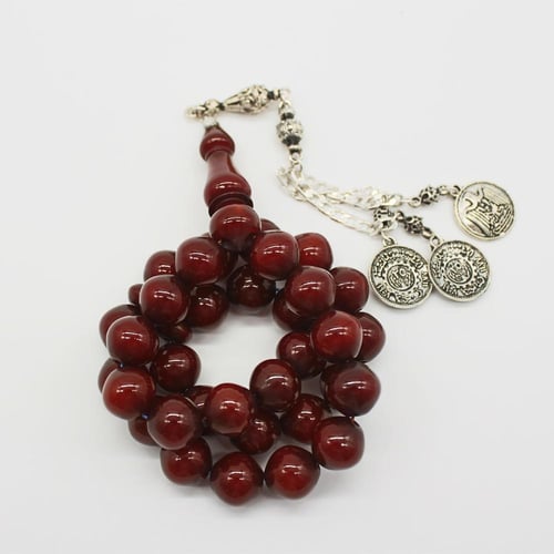 سبحة مسكي عسلي وأسود بخرز دائري وشرابة كلاسيكية