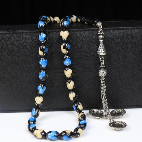 سبحة كوك أسود بنقوش زرقاء وبيضاء