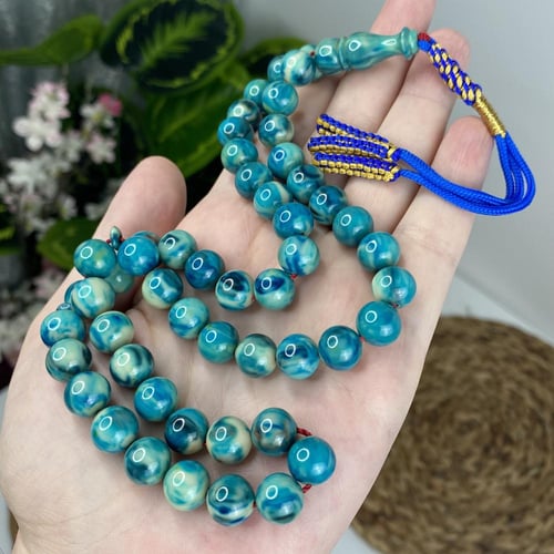 مسباح مسكي تركواز رخامي ممزوج بالأبيض