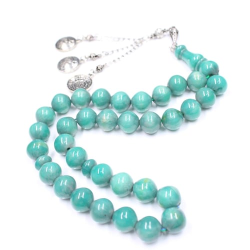 مسباح مسكي تركواز بتصميم كلاسيكي وحبات دائرية