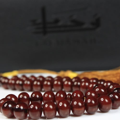 مسباح مسكي بني – خرز دائري مضغوط وكركوشة قطنية