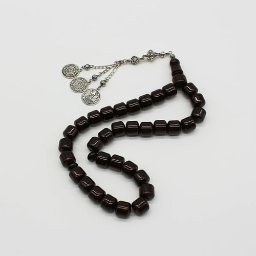 سبحة مسكي باللون الكرزي المائل للاسود , مع شرابة ب...