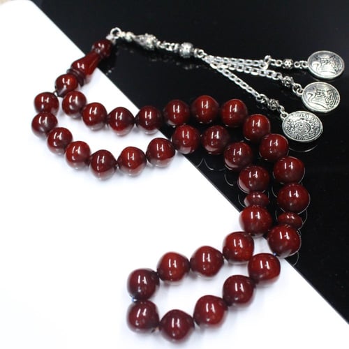 سبحة مسكي عسلي وأسود بخرز دائري وشرابة كلاسيكية