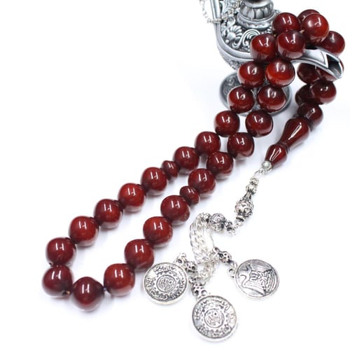 سبحة مسكي عسلي وأسود بخرز دائري وشرابة كلاسيكية