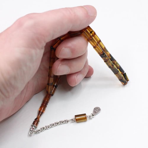 سبحة فاتوران عسلي مطعّمة بالأسود – كركوشة معدنية أ...