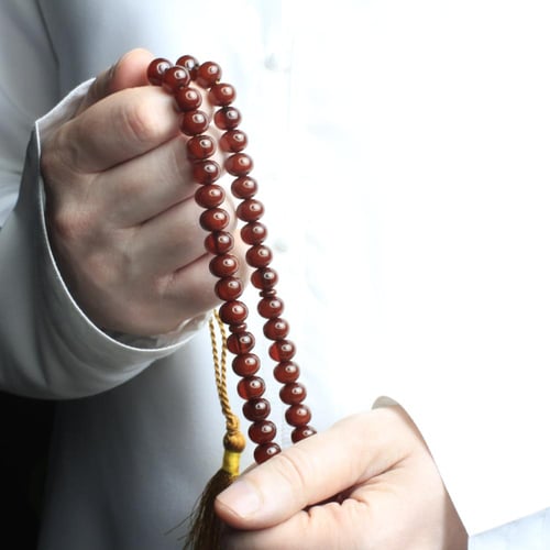 مسباح مسكي بني – خرز دائري مضغوط وكركوشة قطنية