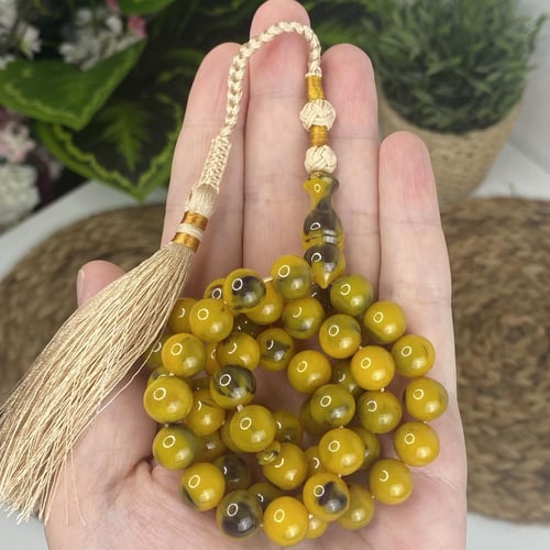 مسباح مسكي أصفر زيتي ببقع خضراء