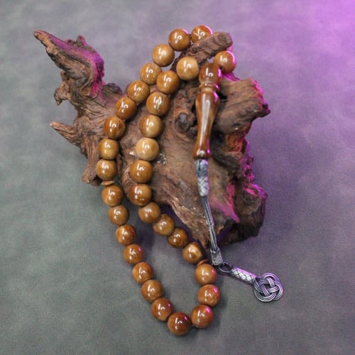 سبحة كوك طبيعي بخيط متين وطربزونة فضة 1000