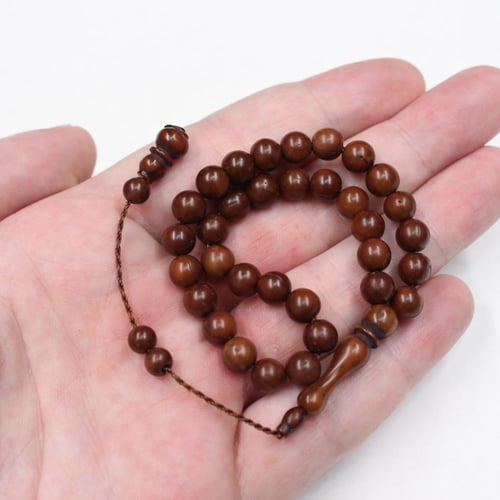 سبحة كوك طبيعي بحبات صغيرة وشرابة أنيقة