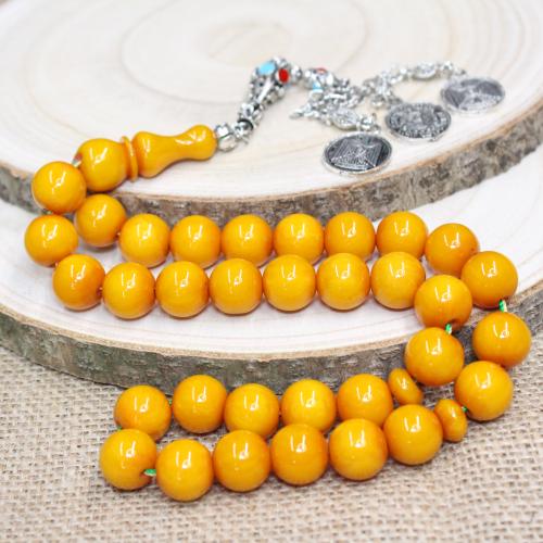 سبحة مسكي عسلي معتق بحبات دائرية وشرابة أثرية