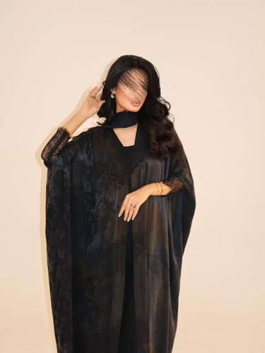 56 عباية نص بشت حرير مغسول تركي رمادي مع تداخل دان...