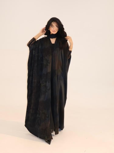 56 عباية نص بشت حرير مغسول تركي رمادي مع تداخل دان...