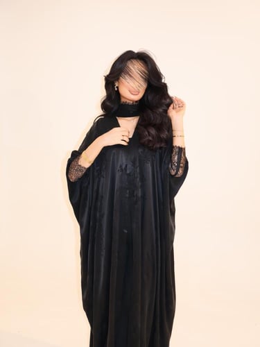 58 عباية نص بشت حرير مغسول تركي اسود مع تداخل دانت...