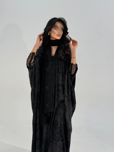 57 عباية نص بشت حرير مغسول تركي رمادي مع تداخل دان...