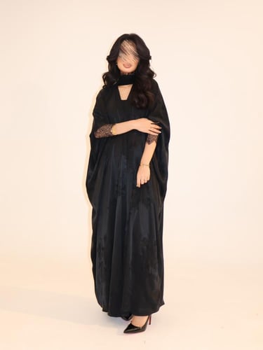 58 عباية نص بشت حرير مغسول تركي اسود مع تداخل دانت...