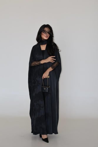 49 عباية نص بشت حرير مغسول تركي رمادي مع تداخل دان...