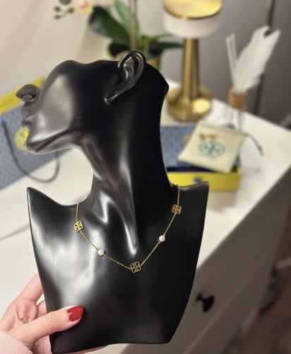 طقم سلسال وحلق توري بورش