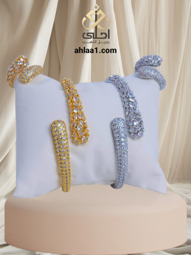 (1)سواره زركون مطلي و(1)خاتم شرقي