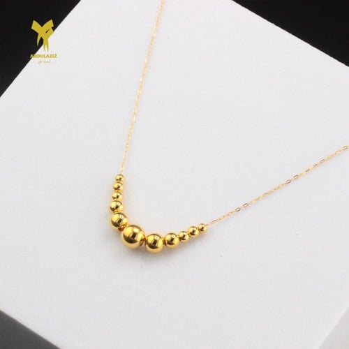 عقد وإسوارة ذهب عيار 21