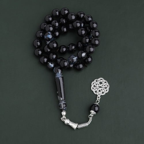 بكلايت اسود مخلوط معدن