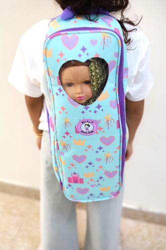 حقيبة دُمية