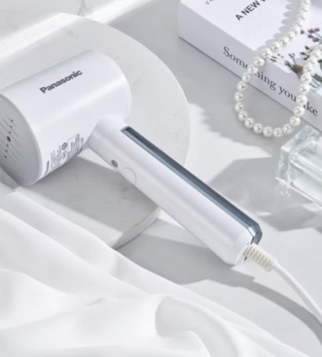 مكواة الملابس البخارية خفيفة الوزن مناسبه للسفر NI...