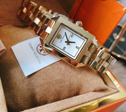 ساعه توري ذهبي