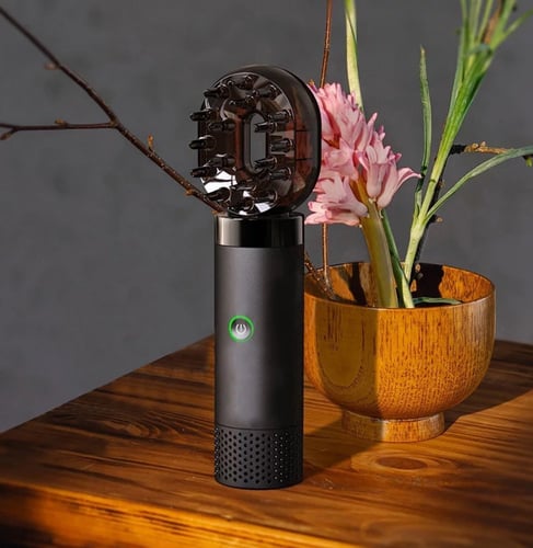 مبخرة الكترونية مزودة بمشط لتبخير الشعر