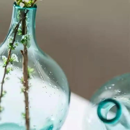 مزهرية زجاجية متباينة ازرق