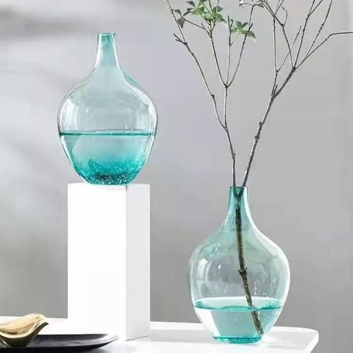 مزهرية زجاجية متباينة ازرق